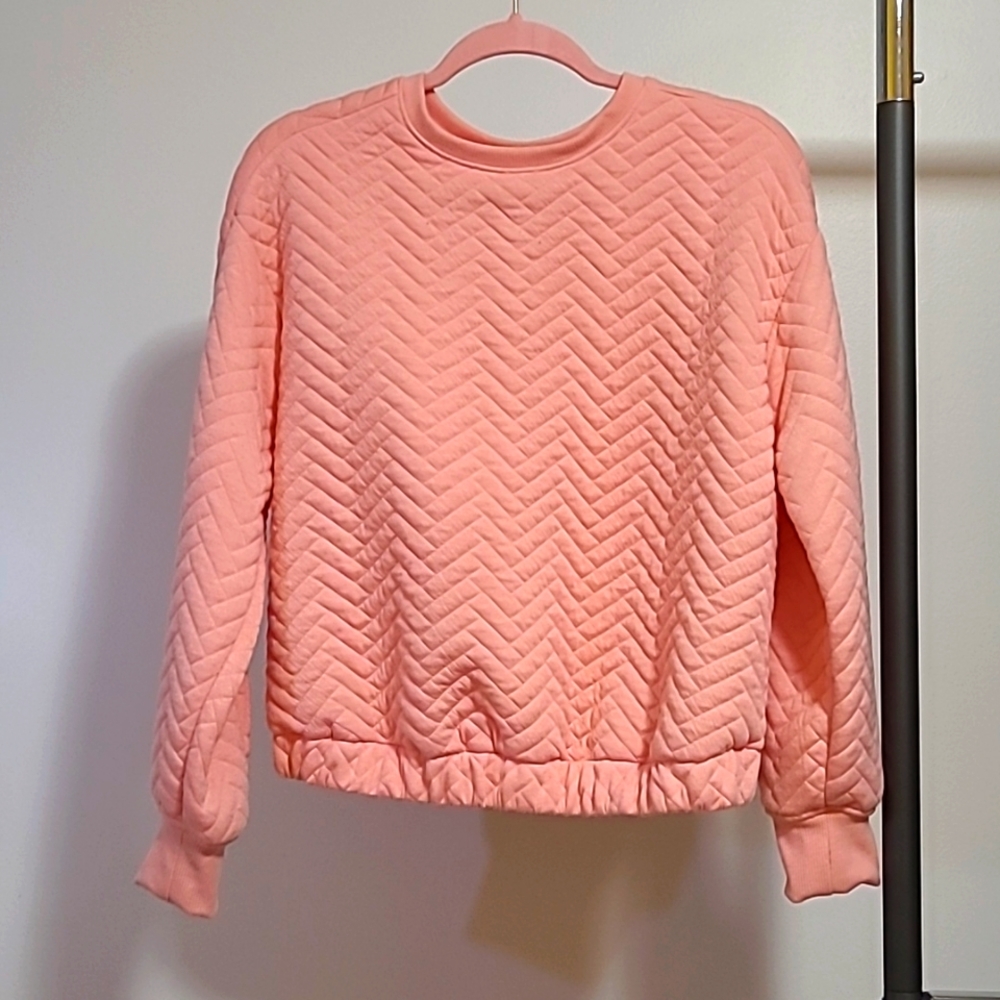 A New Day boxy pink herring pattern pullover sweater.